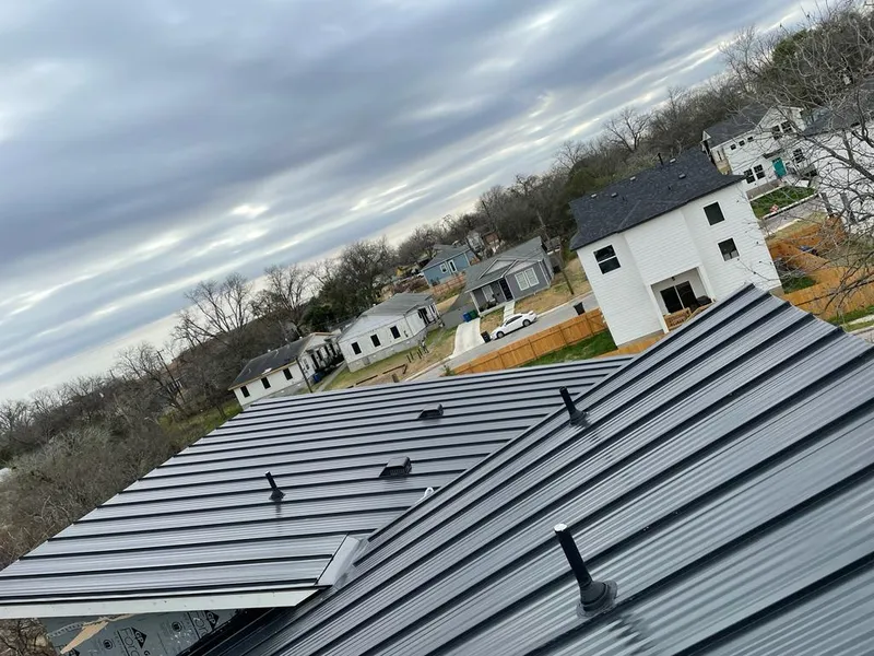 Standing seam metal roof panels with vents for Skylight Repair in Euless